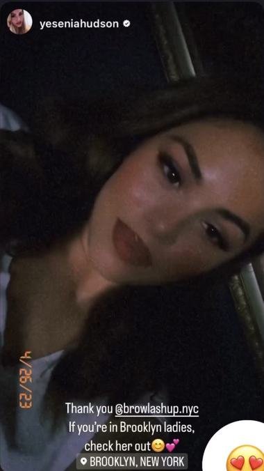 A client wearing lashes by brow and lash up